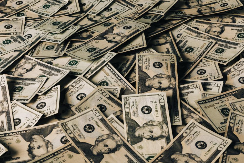 Scattered Dollar Bills Photo Scattered Dollar Bills Photo
