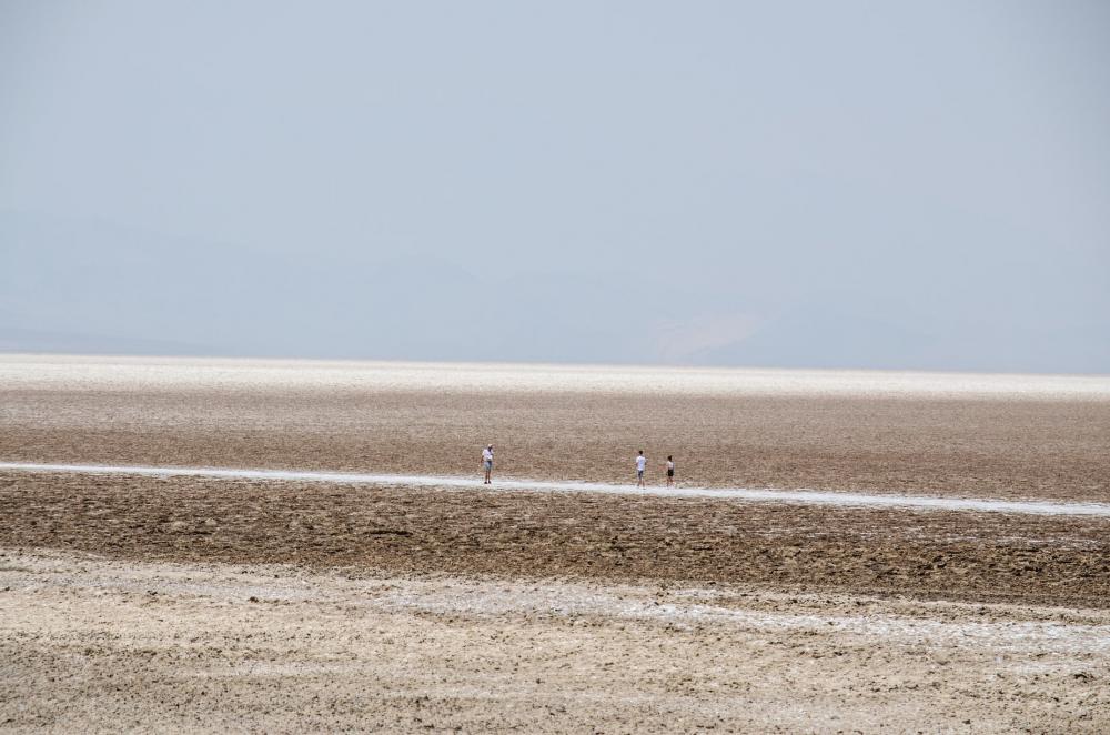 Tourists Traverse A Desolate Wasteland Photo Tourists Traverse A Desolate Wasteland Photo
