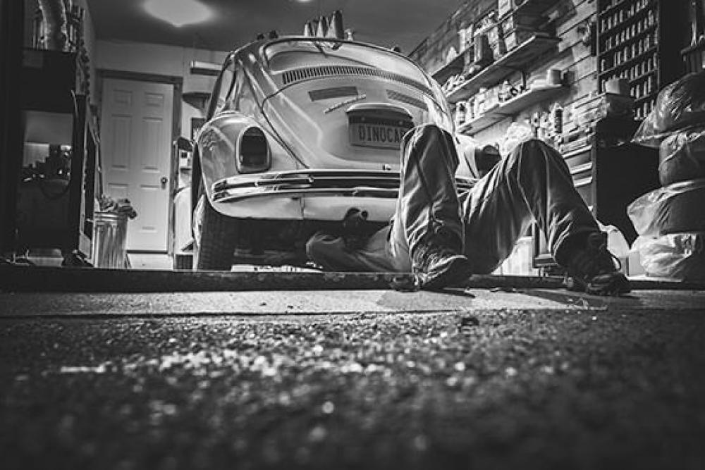 Mechanic Under Car Free Photo Mechanic Under Car Free Photo