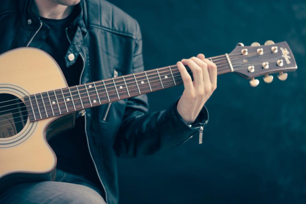 Man Playing Guitar Man Playing Guitar