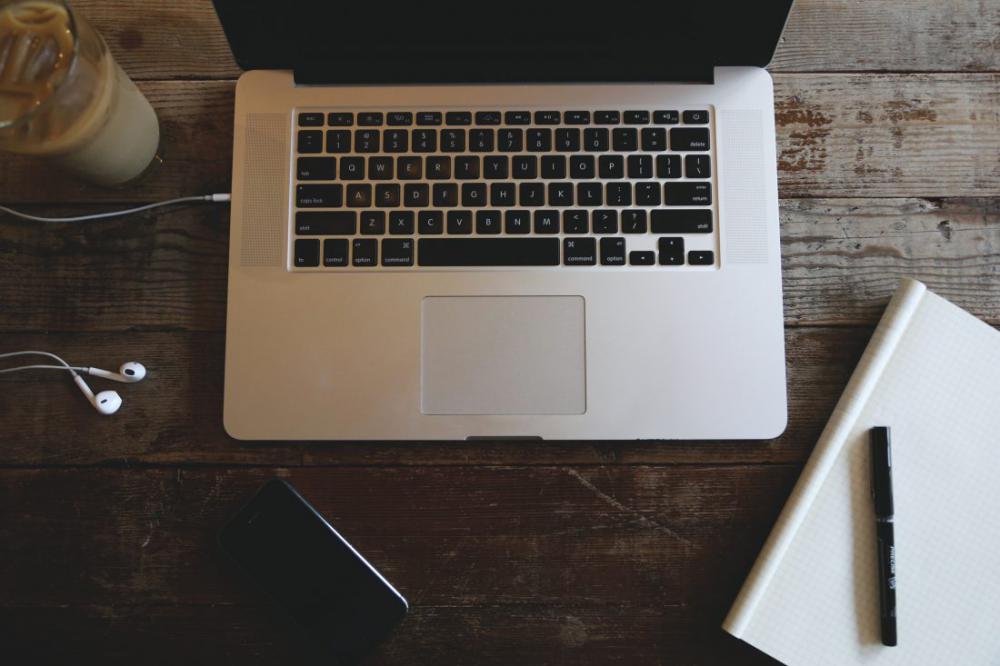 Laptop on Wooden Desk Laptop on Wooden Desk