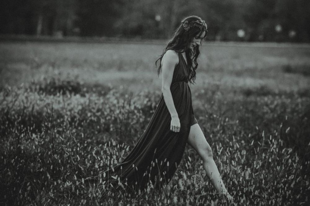 Woman Walking in Field Woman Walking in Field