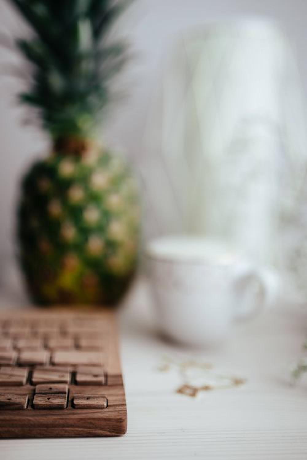 Wooden keyboard and cup of coffee Wooden keyboard and cup of coffee