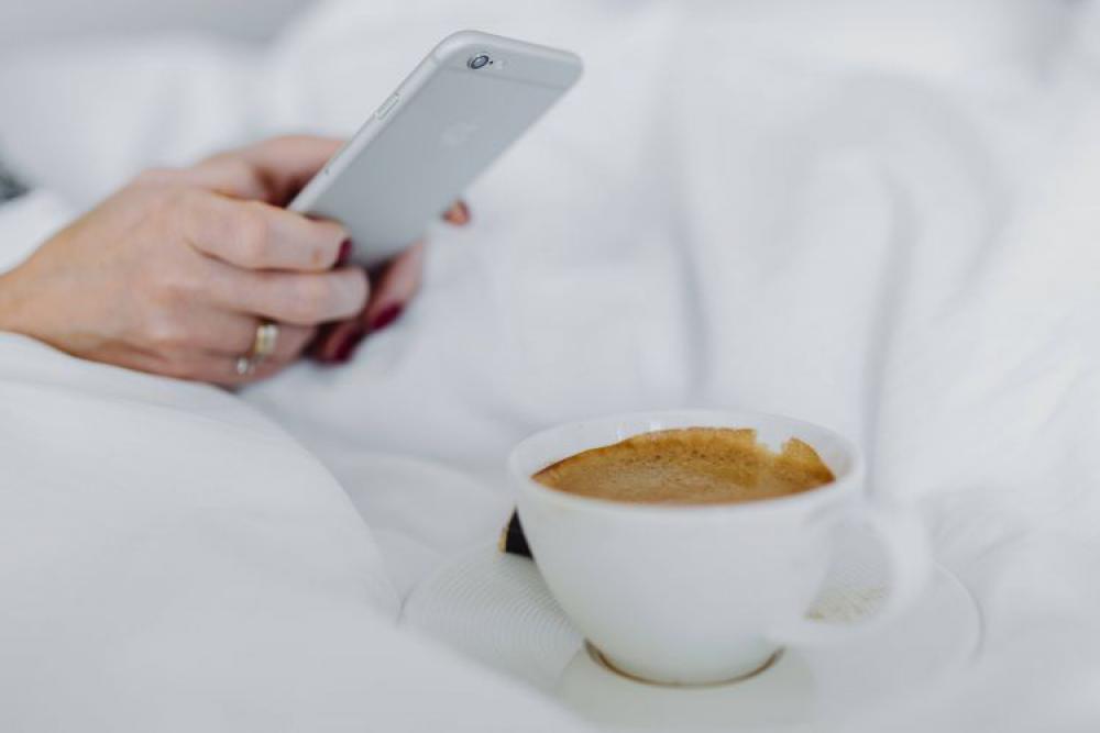 Morning coffee with chocolate in bed Morning coffee with chocolate in bed