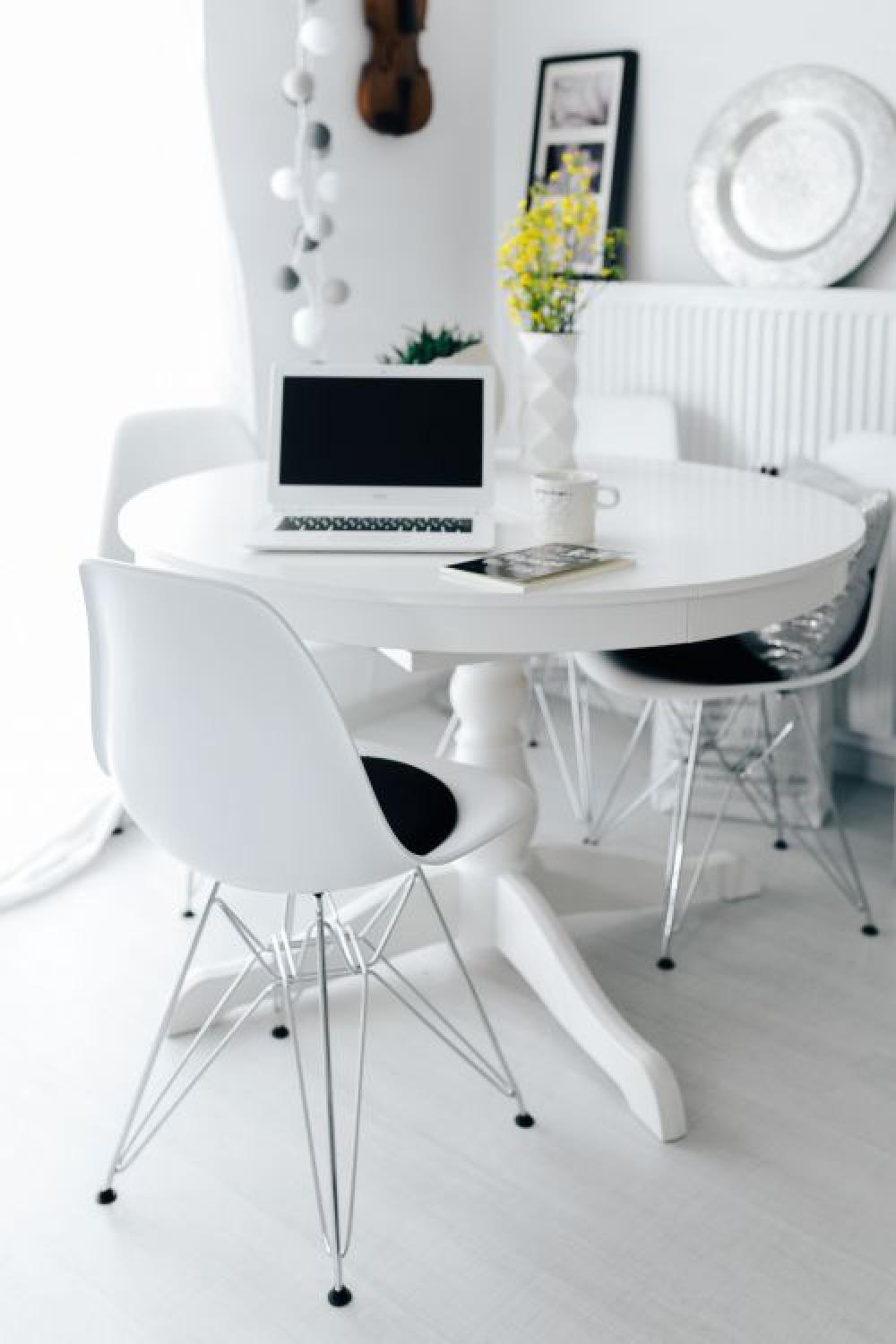Workplace with laptop on table at home Workplace with laptop on table at home