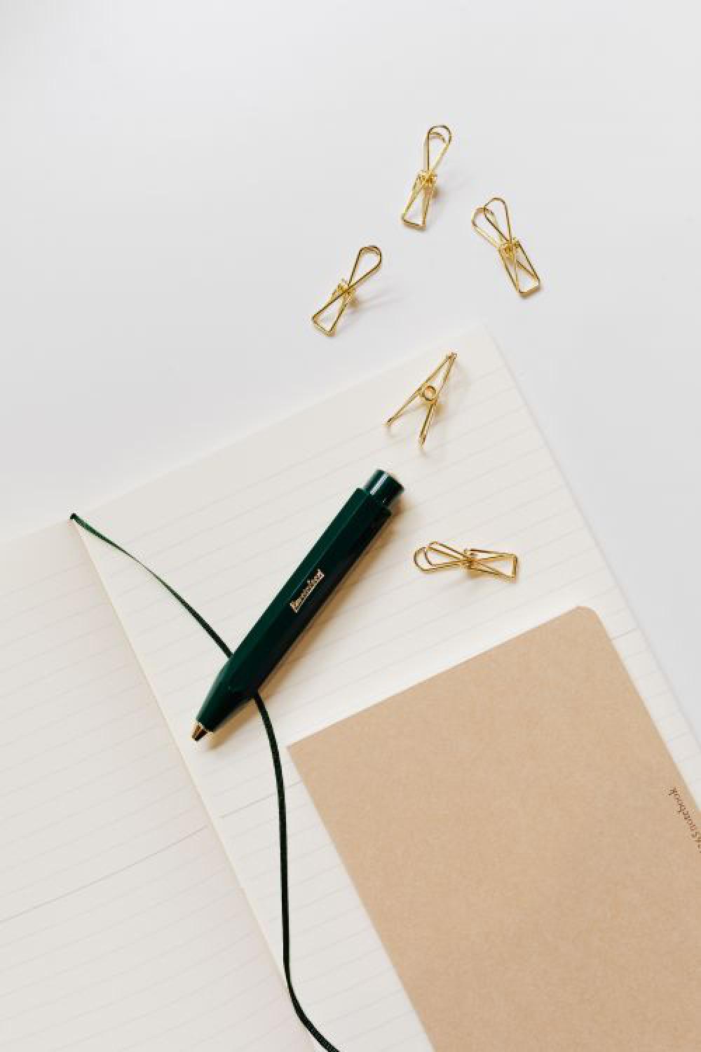 Office supplies on a white desk Office supplies on a white desk