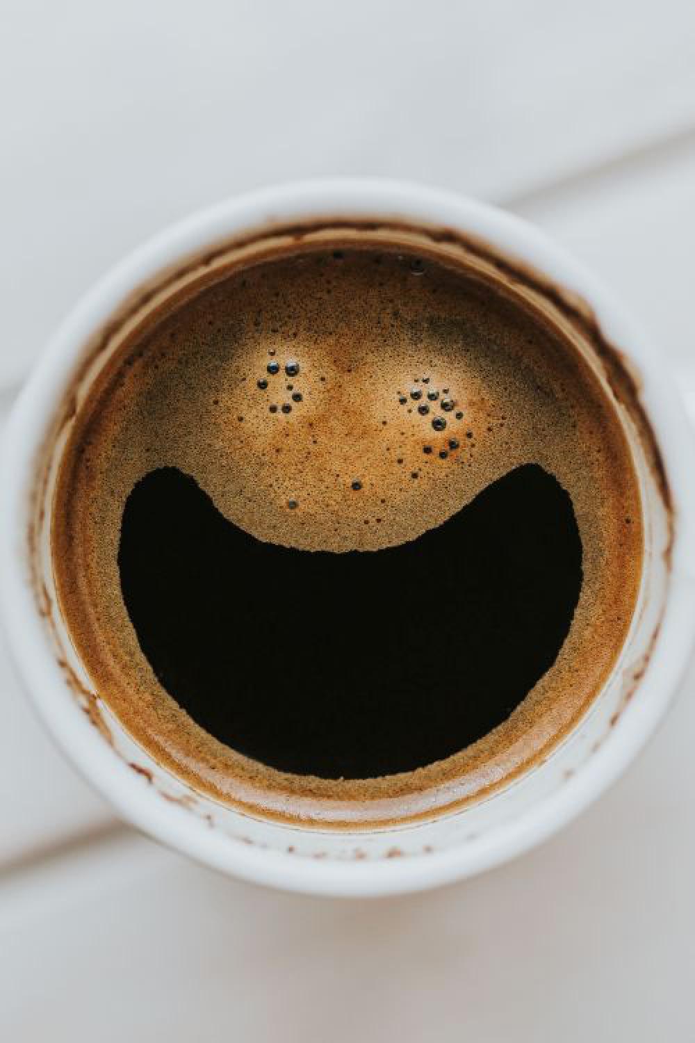 Coffee on a table with other items Coffee on a table with other items