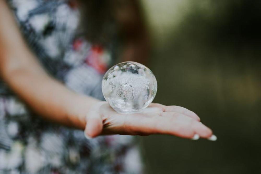 Woman with a little crystal ball Woman with a little crystal ball