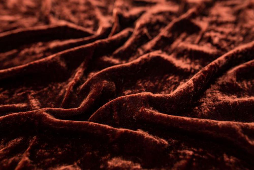 Creased brown fabric Creased brown fabric