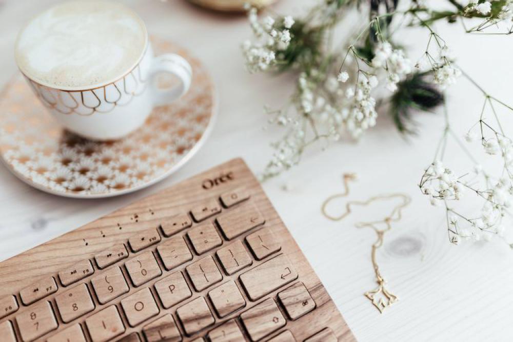 Wooden keyboard and cup of coffee Wooden keyboard and cup of coffee