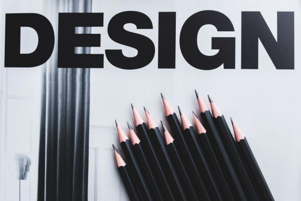 Pencils, magazines and an old lightbulb Pencils, magazines and an old lightbulb