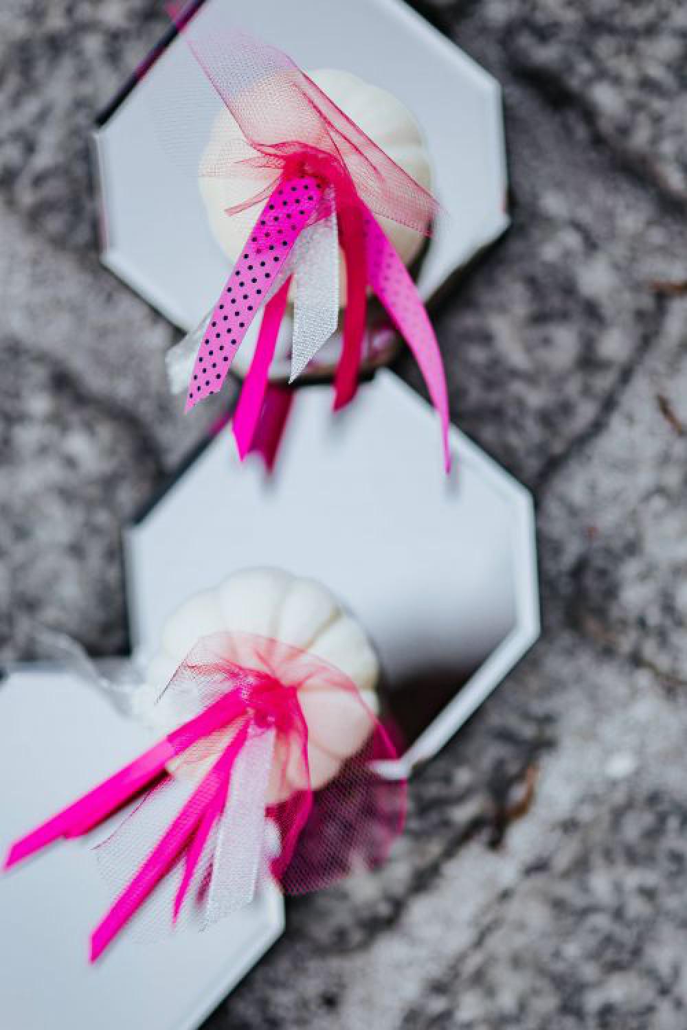 Decorative white pumpkin trinkets with ribbons on the floor Decorative white pumpkin trinkets with ribbons on the floor