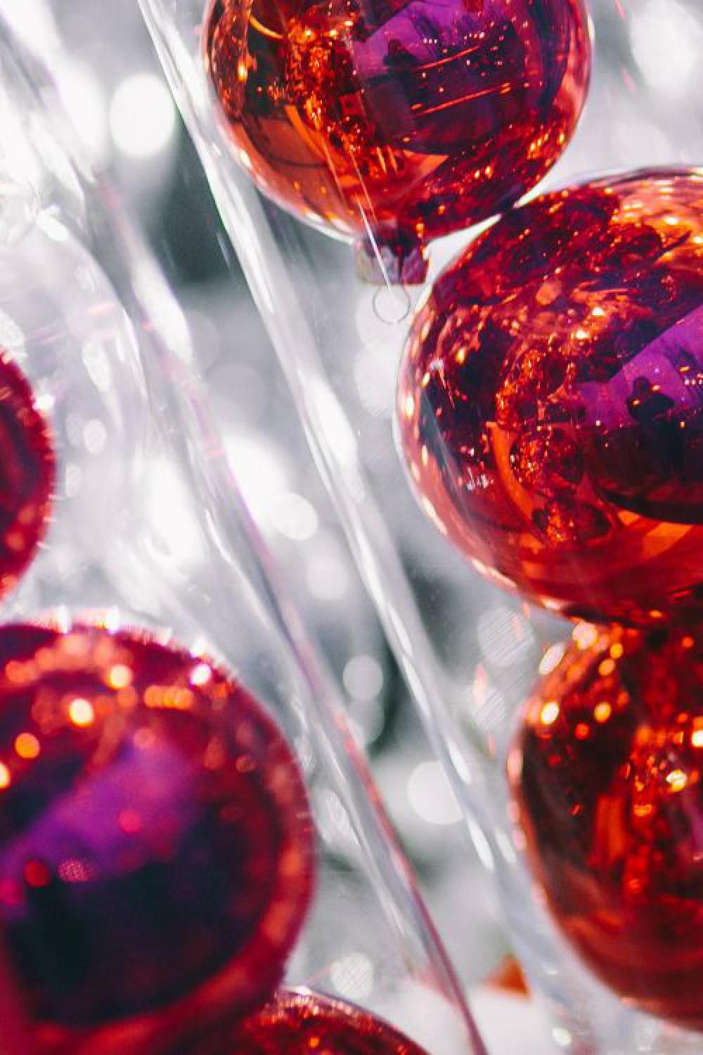 Red Christmas baubles packed in plastic tubes Red Christmas baubles packed in plastic tubes