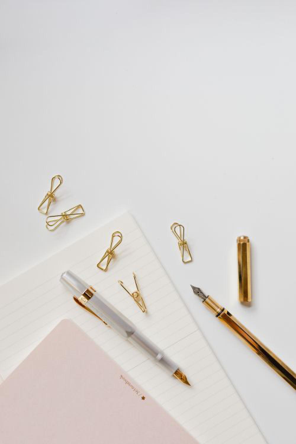 Office supplies on a white desk Office supplies on a white desk