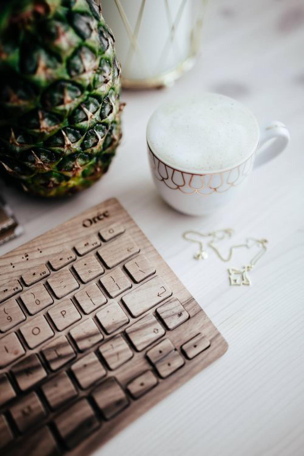 Wooden keyboard and cup of coffee Wooden keyboard and cup of coffee