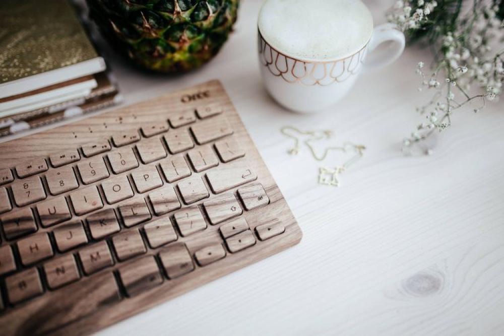 Wooden keyboard and cup of coffee Wooden keyboard and cup of coffee