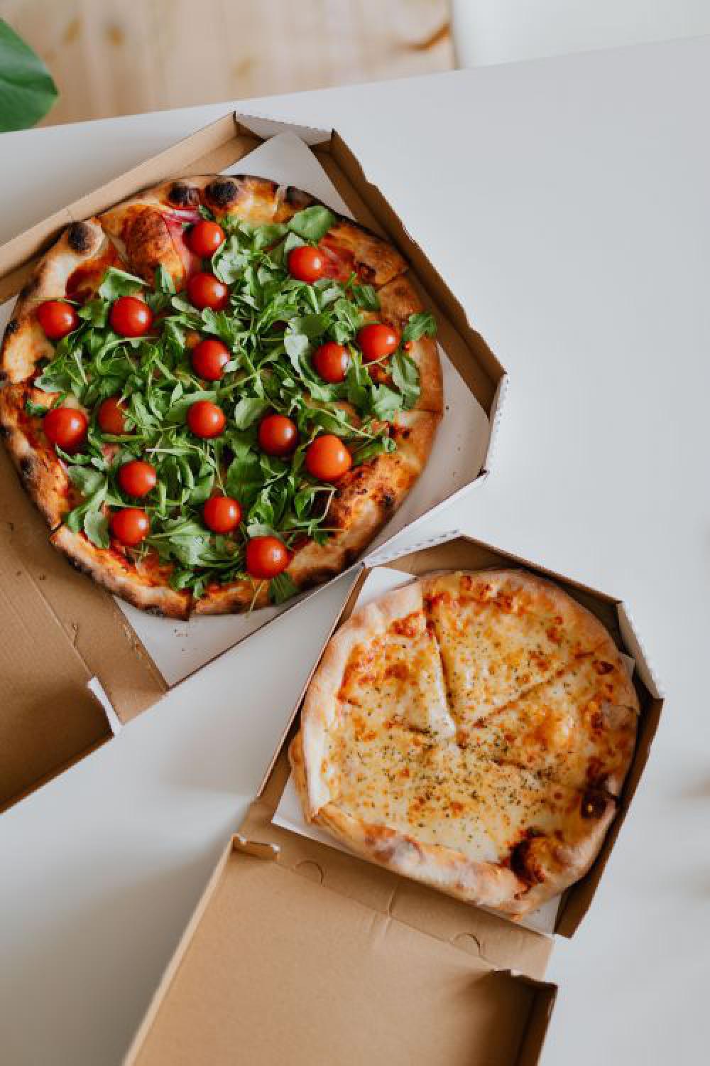 A workplace full of pizza A workplace full of pizza