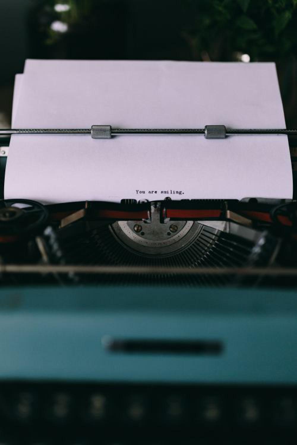 Closeup view of typing quotes on the old typewriter Closeup view of typing quotes on the old typewriter