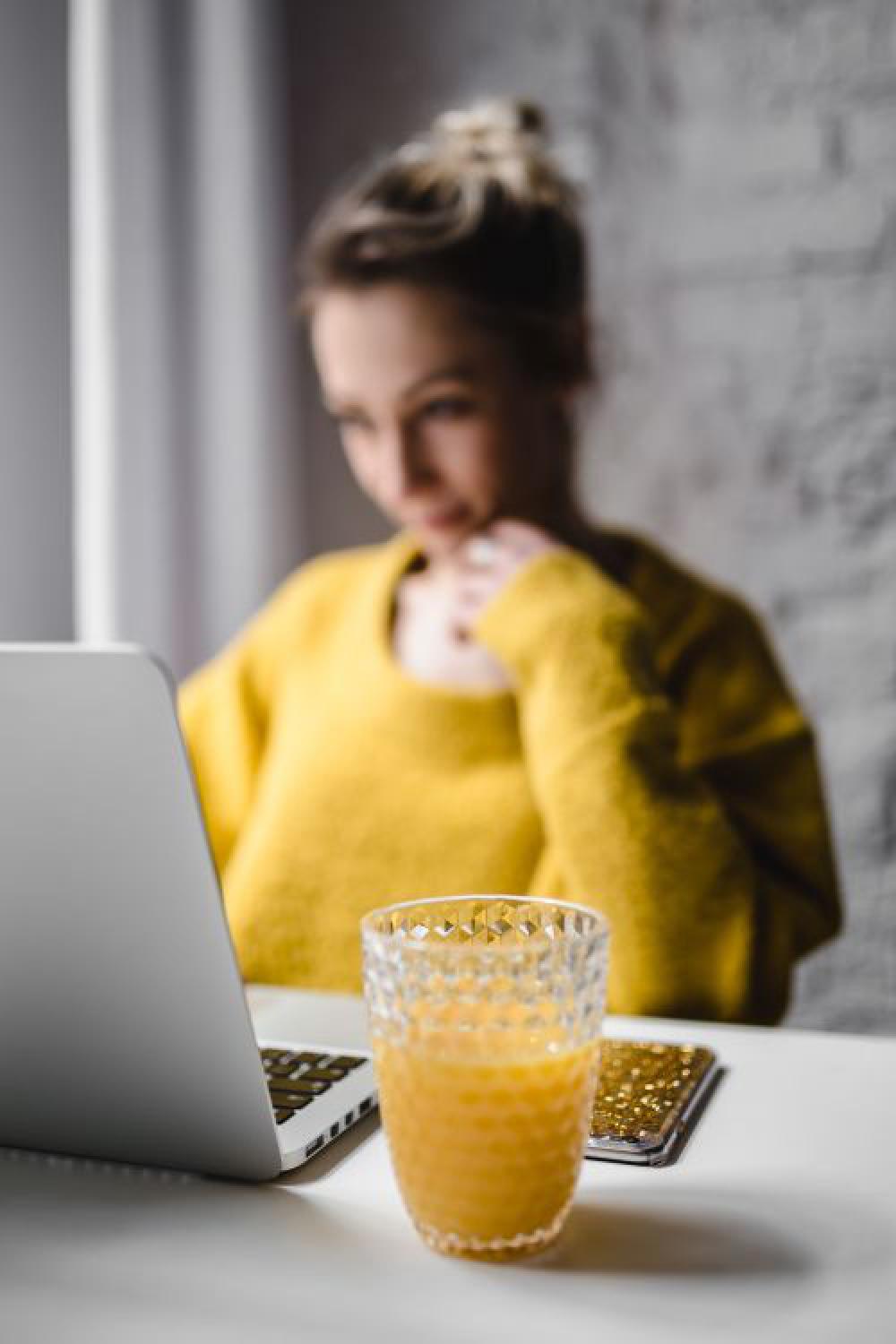 Businesswoman Working at Her Laptop Businesswoman Working at Her Laptop