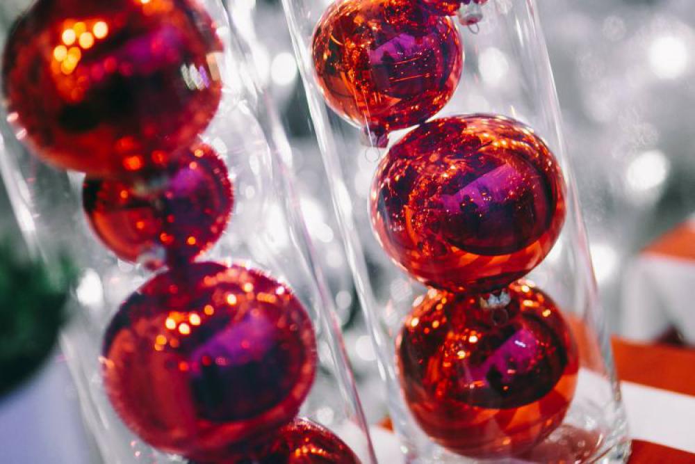 Red Christmas baubles packed in plastic tubes Red Christmas baubles packed in plastic tubes