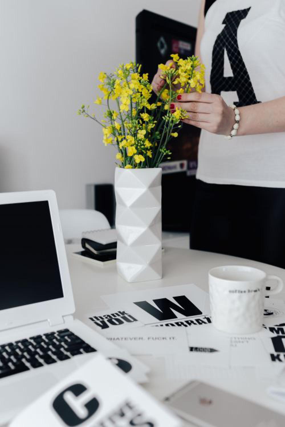 Workspace with yellow flowers Workspace with yellow flowers