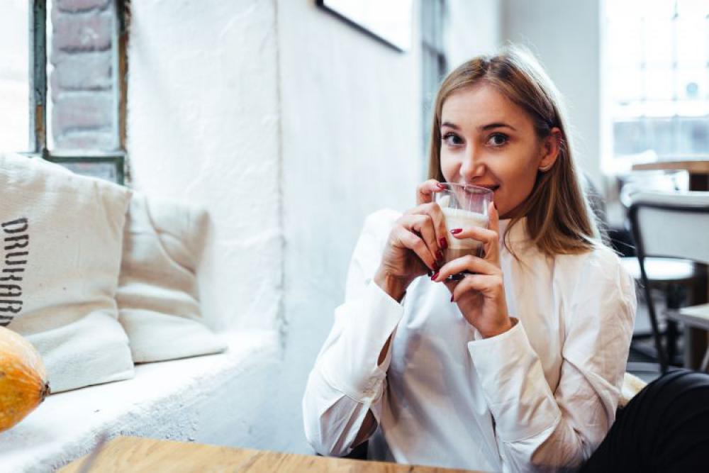 Pretty blonde woman sitting in the cafe Pretty blonde woman sitting in the cafe