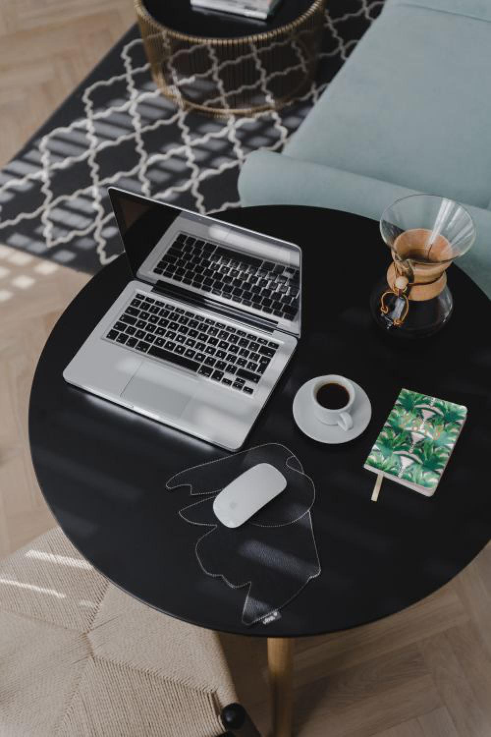 Workplace with laptop on table at home Workplace with laptop on table at home