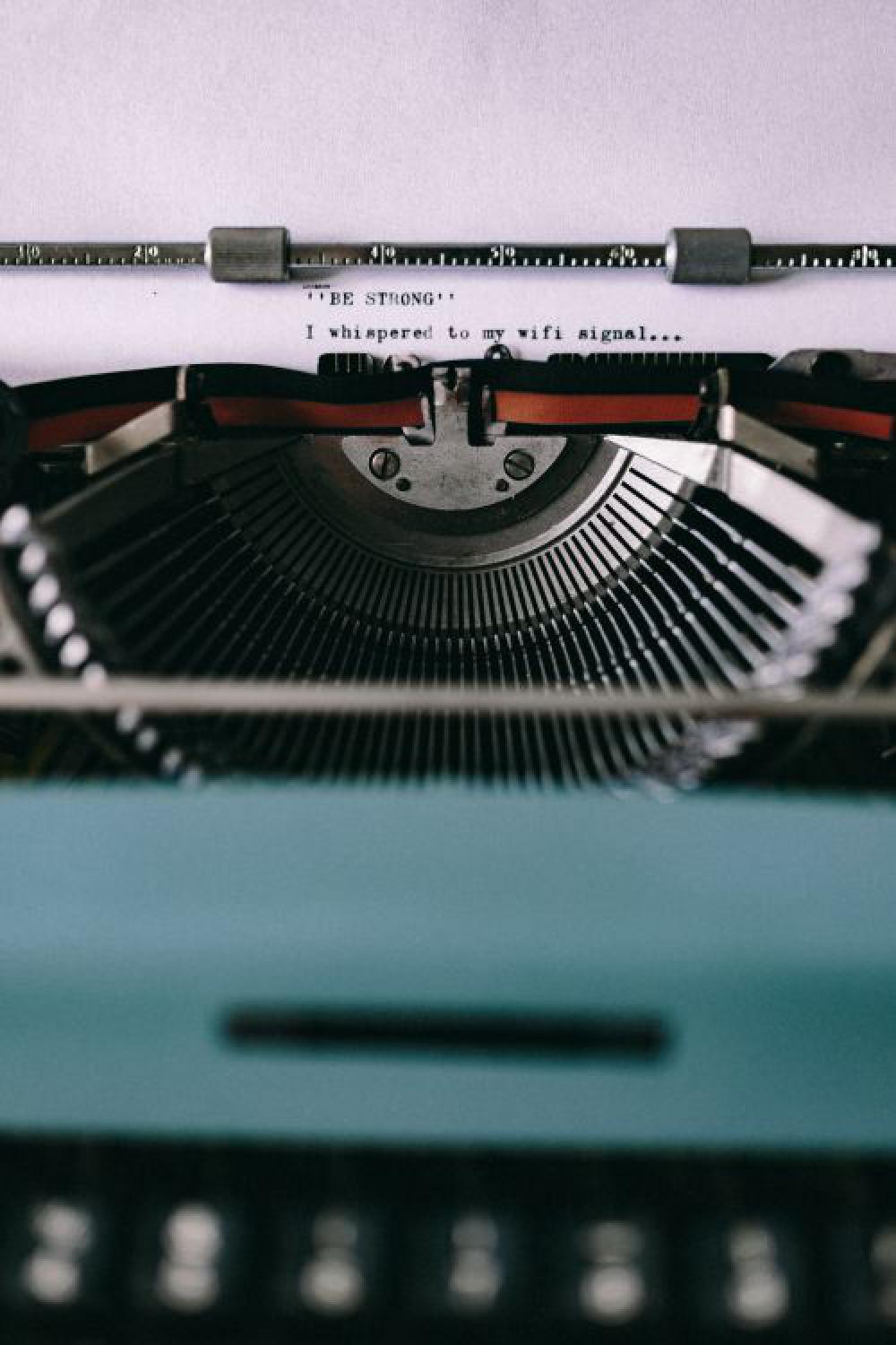 Closeup view of typing quotes on the old typewriter Closeup view of typing quotes on the old typewriter