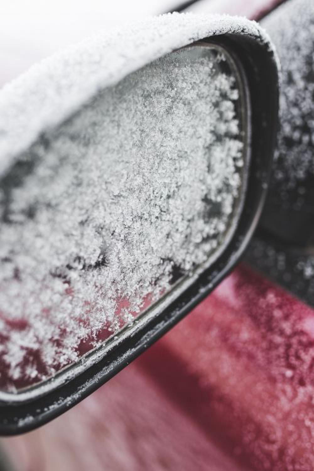 Frost on a red car Frost on a red car