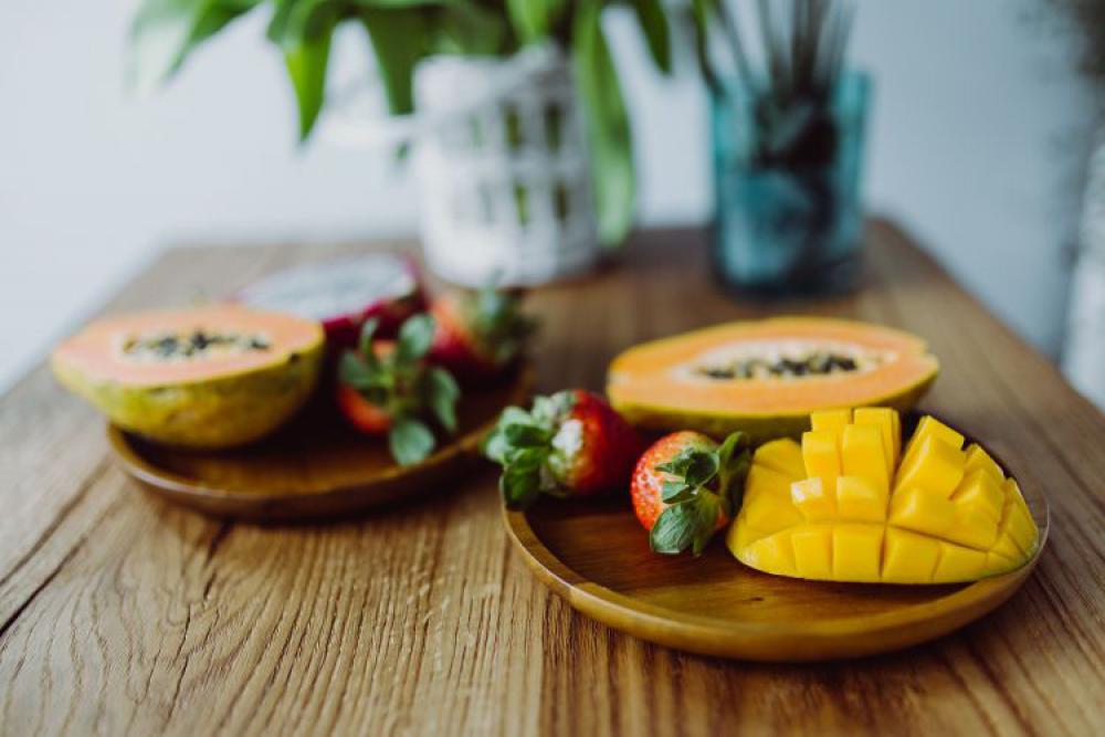 Exotic fruits on a wooden table Exotic fruits on a wooden table