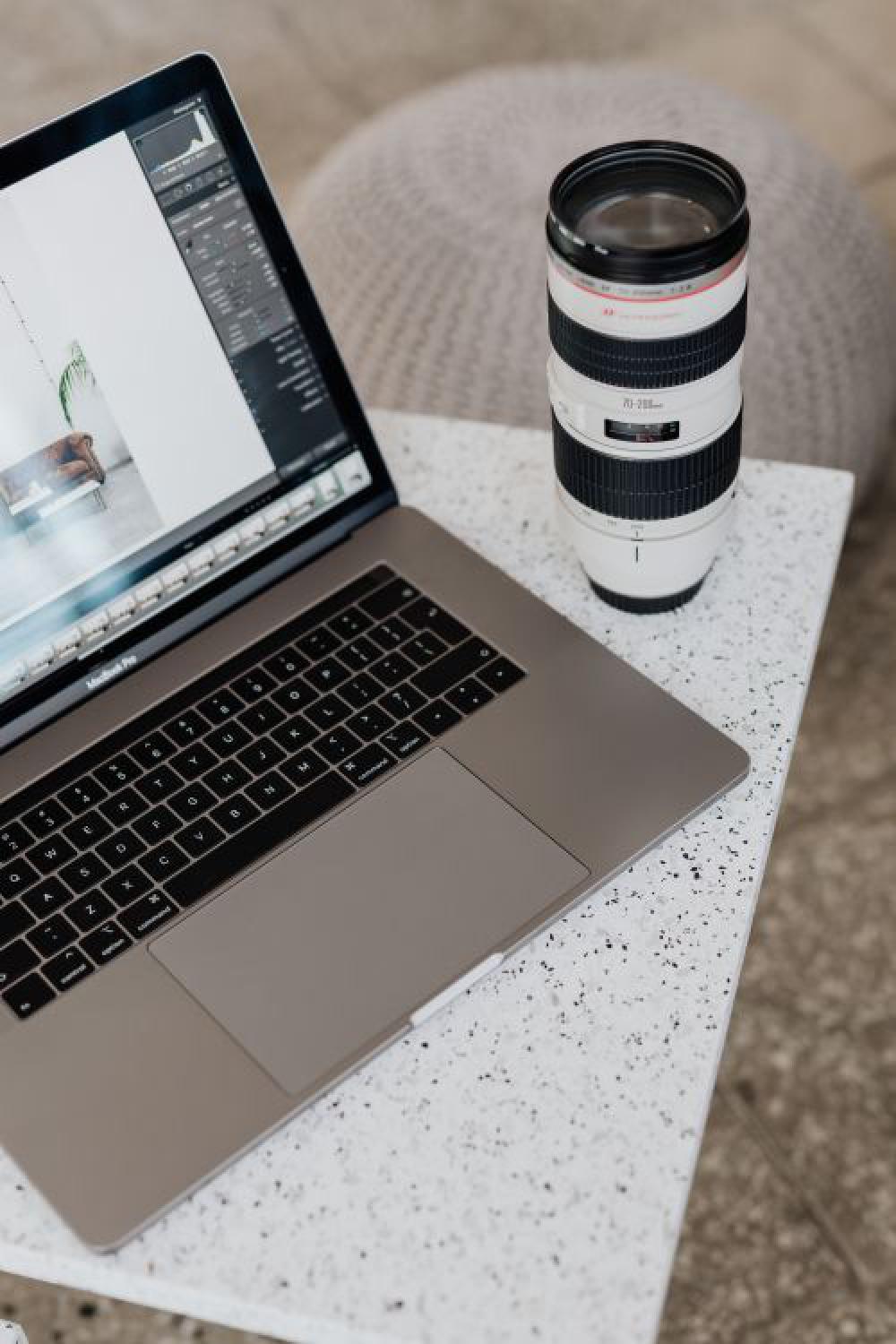 Photographer working with a laptop Photographer working with a laptop