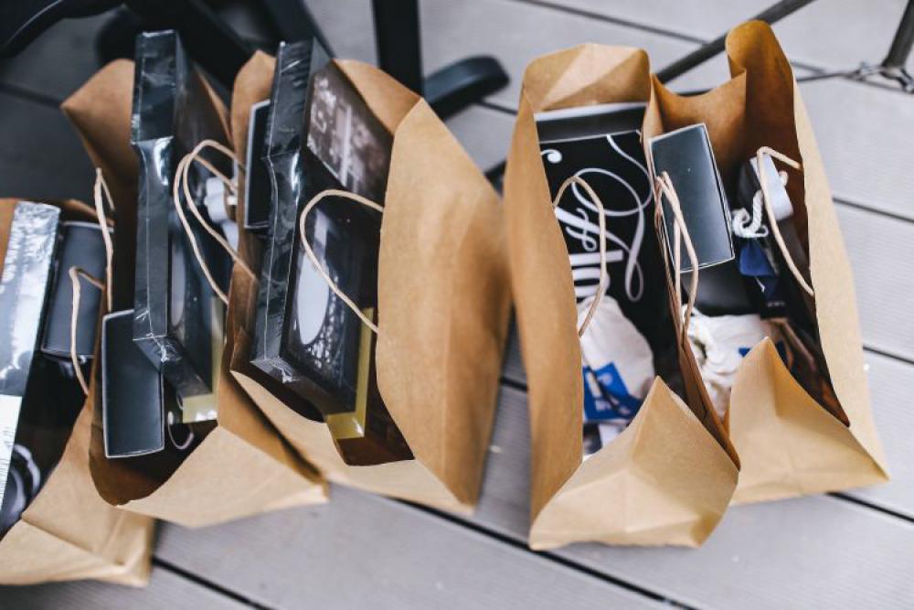 Brown paper shopping bags full of decorations Brown paper shopping bags full of decorations