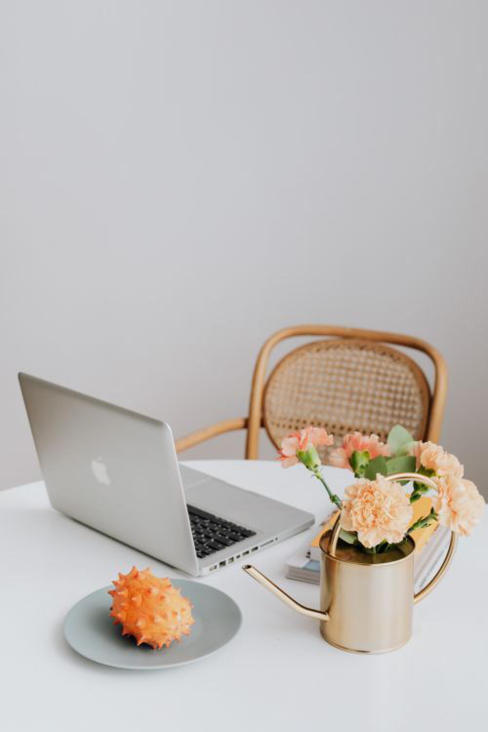 A woman works on a laptop at home A woman works on a laptop at home