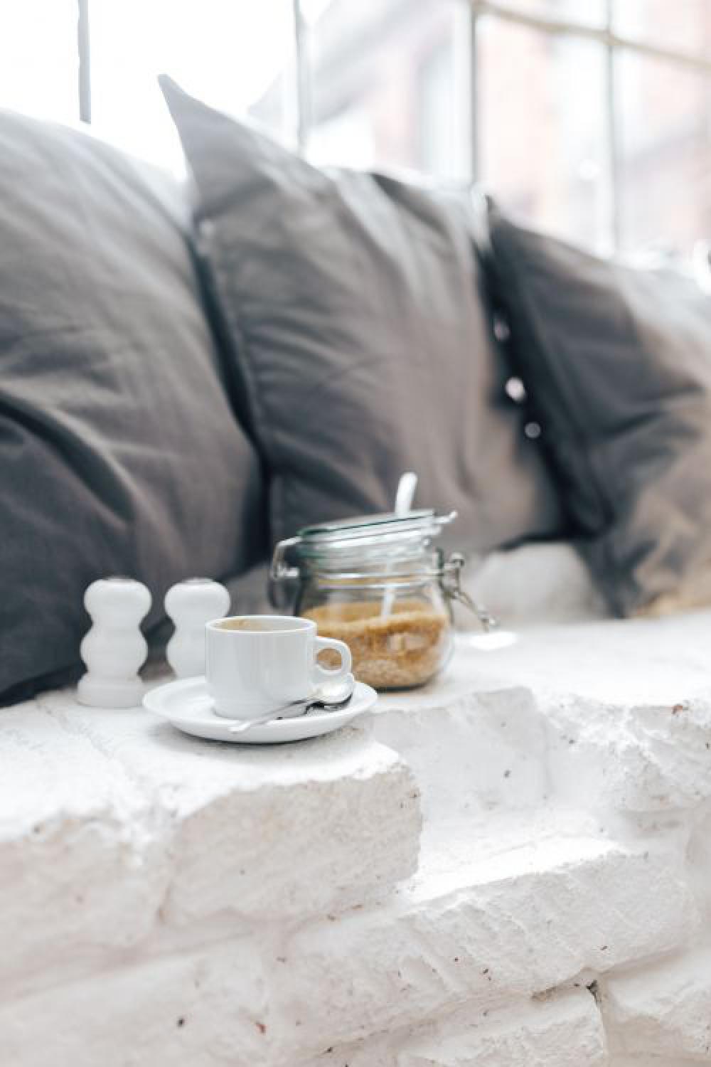 Morning coffee with a jar of brown sugar Morning coffee with a jar of brown sugar