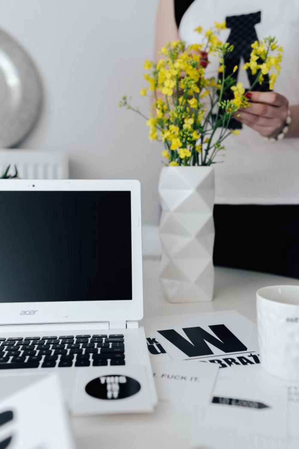 Workspace with yellow flowers Workspace with yellow flowers