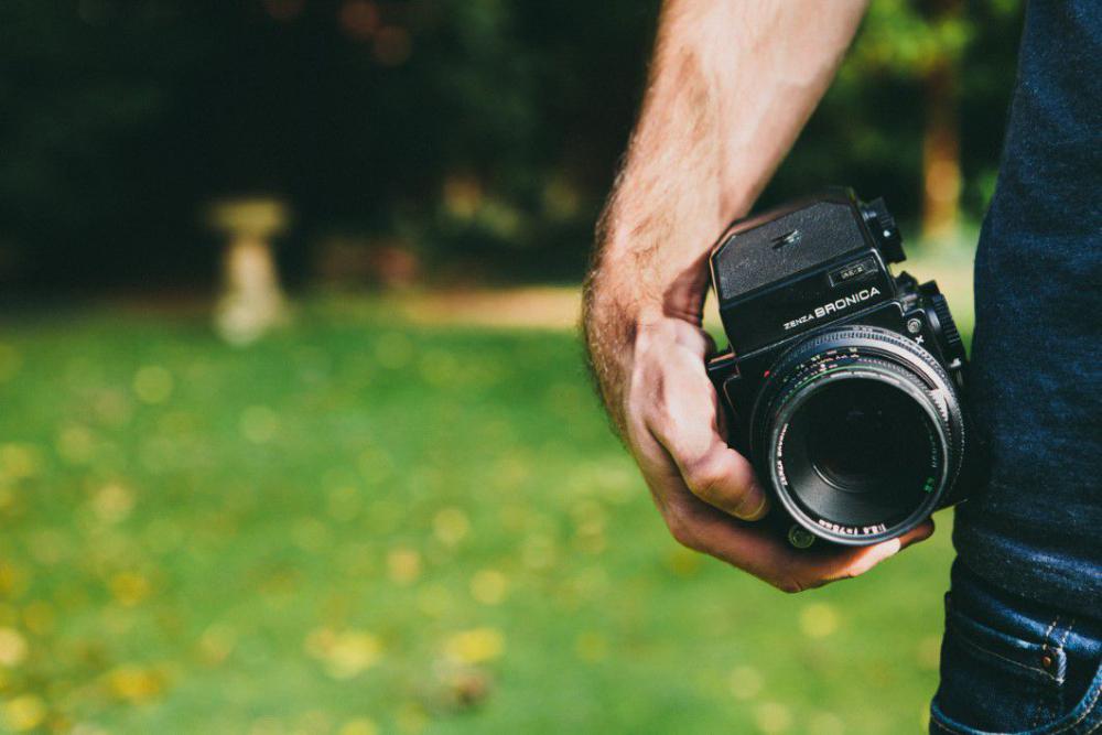 Man Holding Camera Free Photo Man Holding Camera Free Photo