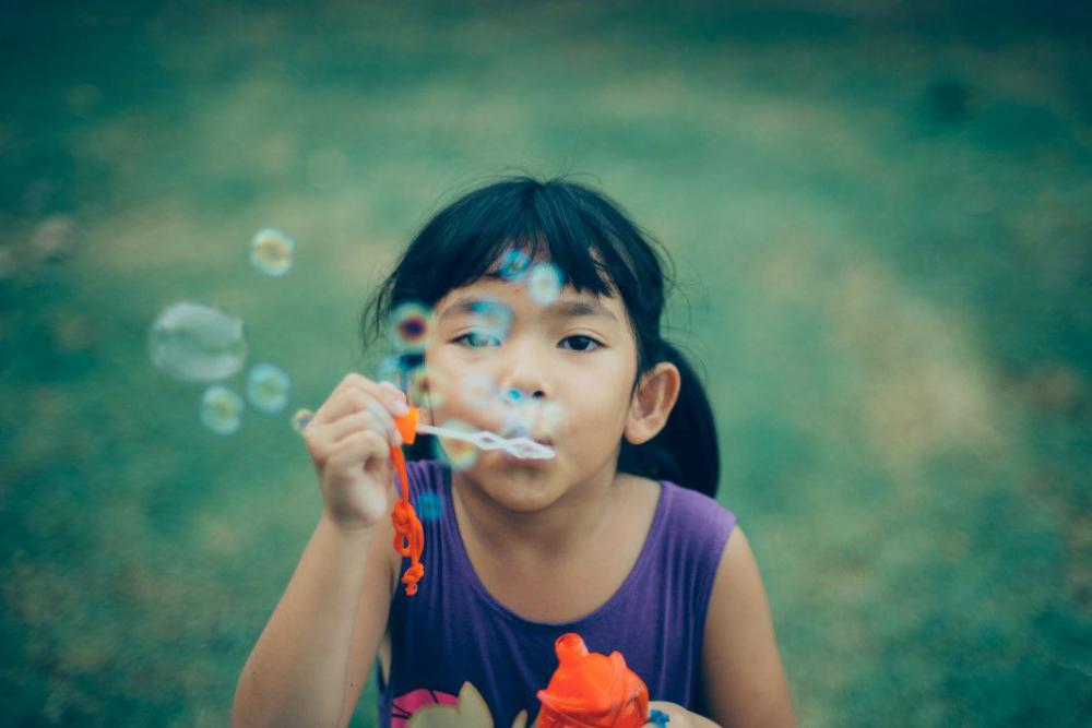 Girl Blowing Bubbles Free Photo Girl Blowing Bubbles Free Photo