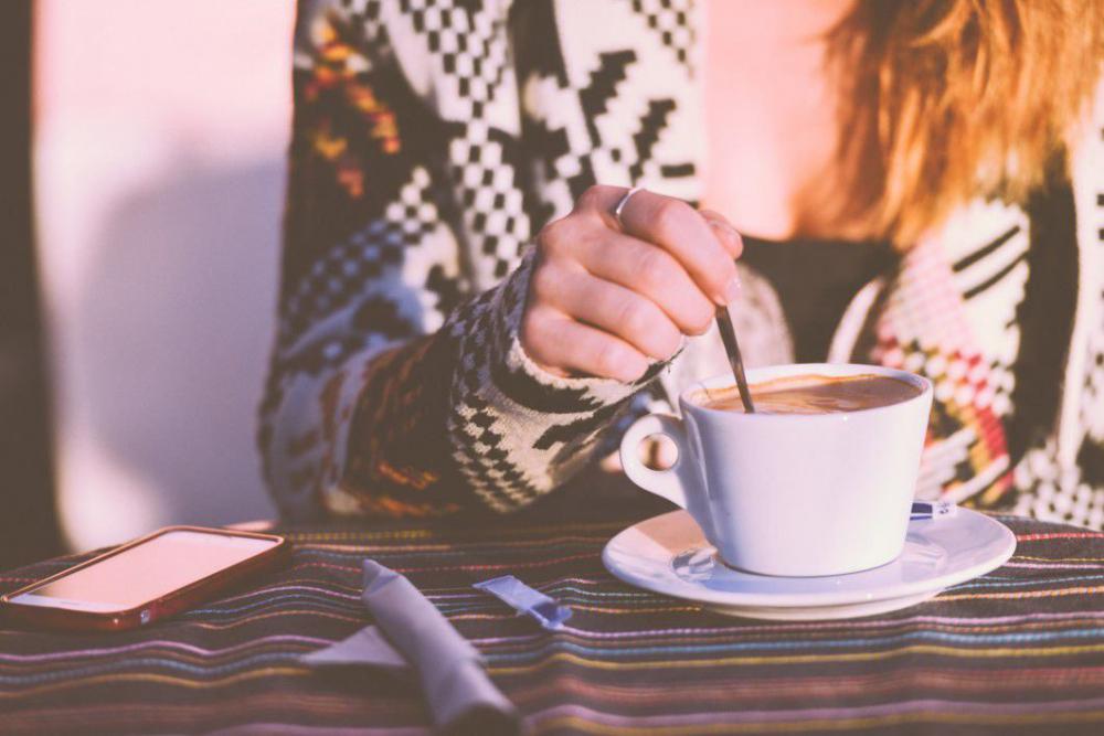 Woman Stirring Coffee Free Photo Woman Stirring Coffee Free Photo