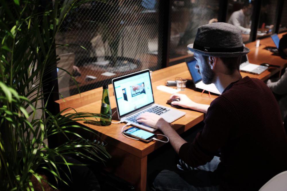Man MacBook Desk Wood Hat Free Photo Man MacBook Desk Wood Hat Free Photo