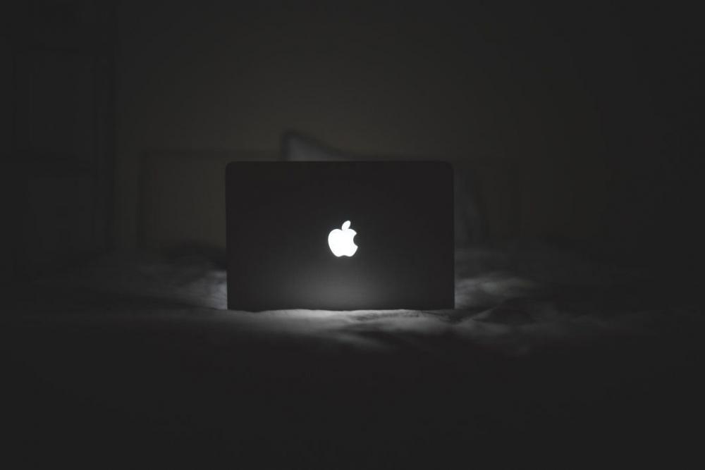 B&W MacBook Glowing Apple Logo Free Photo B&W MacBook Glowing Apple Logo Free Photo