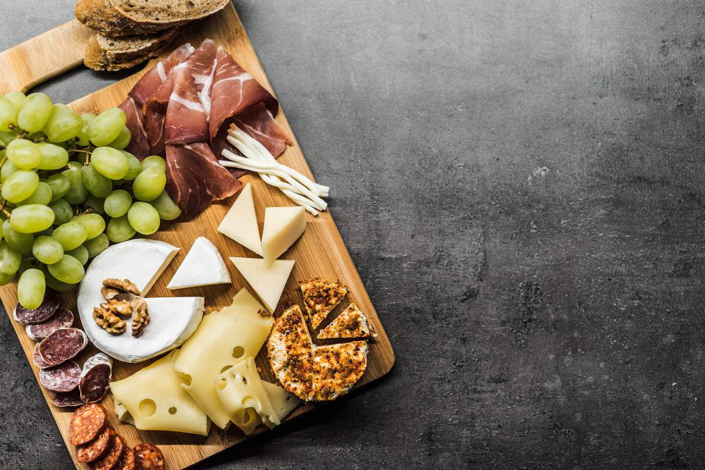 Tasting Cheese Dish on a Wooden Plate Free Photo Tasting Cheese Dish on a Wooden Plate Free Photo