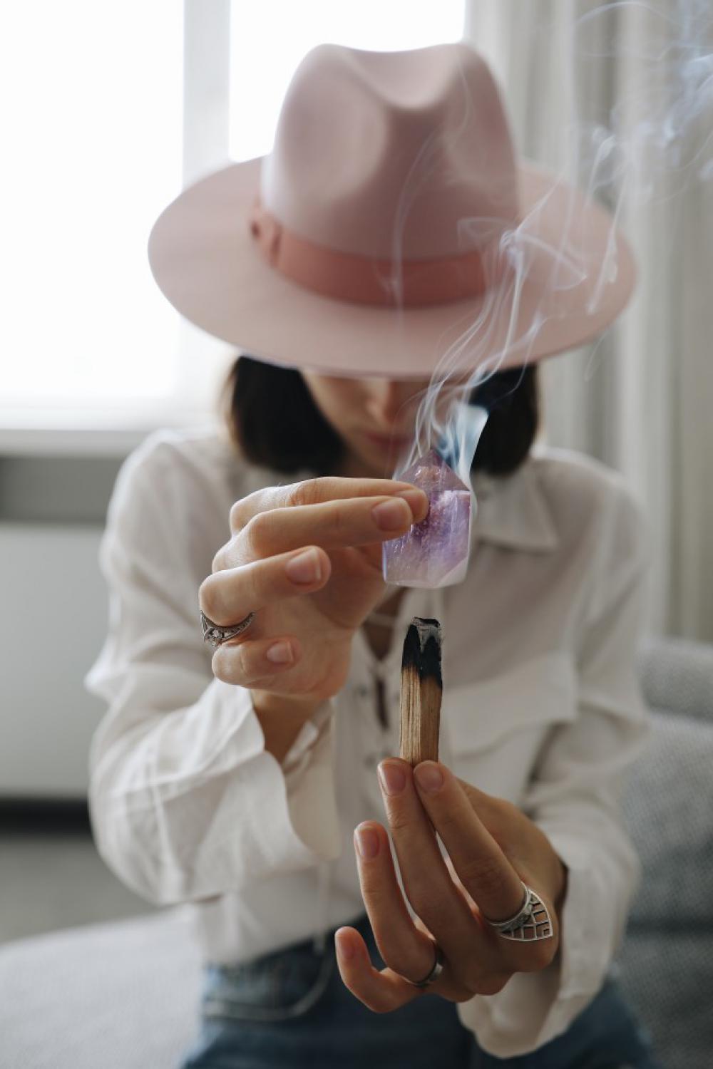 Shaman with palo santo and crystal Shaman with palo santo and crystal
