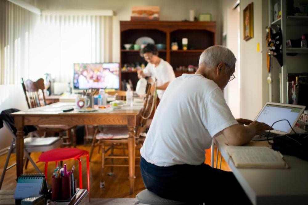 Elder man on computer Elder man on computer
