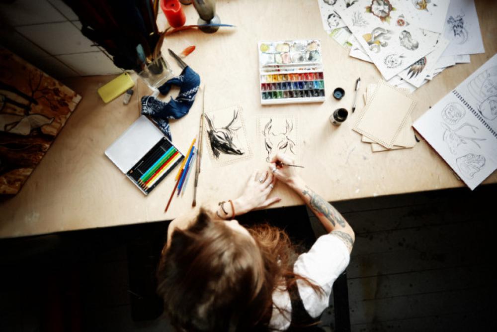 Creative artist in the working flow. Creative artist in the working flow.