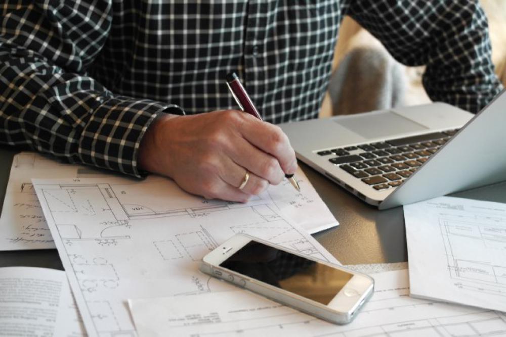 Financial budgeting and planning. Working at office desk. Financial budgeting and planning. Working at office desk.