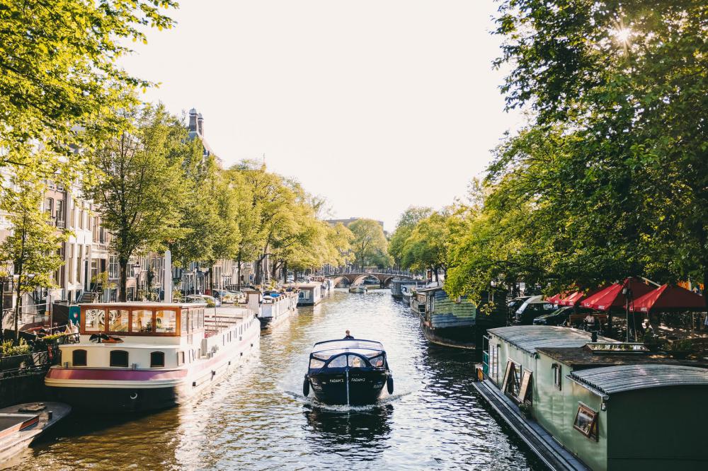Shaded Canal In Amsterdam Photo Shaded Canal In Amsterdam Photo