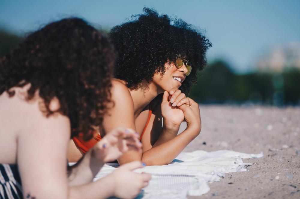Sunbathers Enjoy The Beach Photo Sunbathers Enjoy The Beach Photo