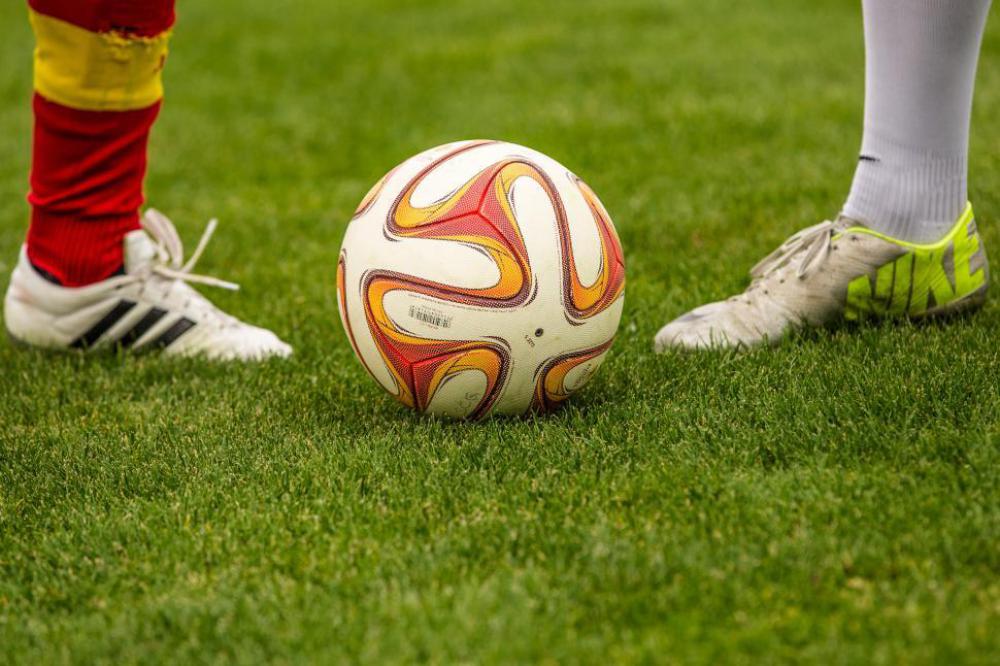 Close-up of football on field Close-up of football on field