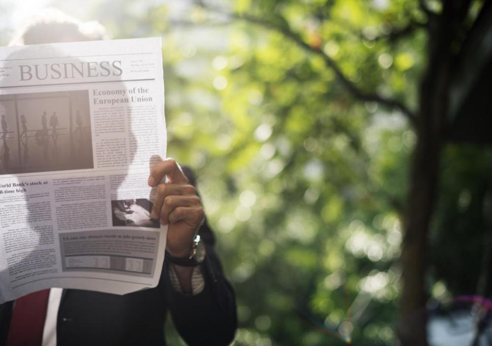 Reading Business News Reading Business News