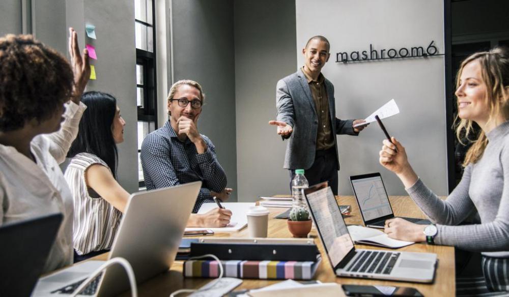 Talking in a business meeting Talking in a business meeting